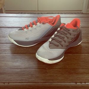 A pair of curry 4 lows